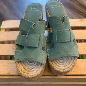 Light aqua slip on wedge.